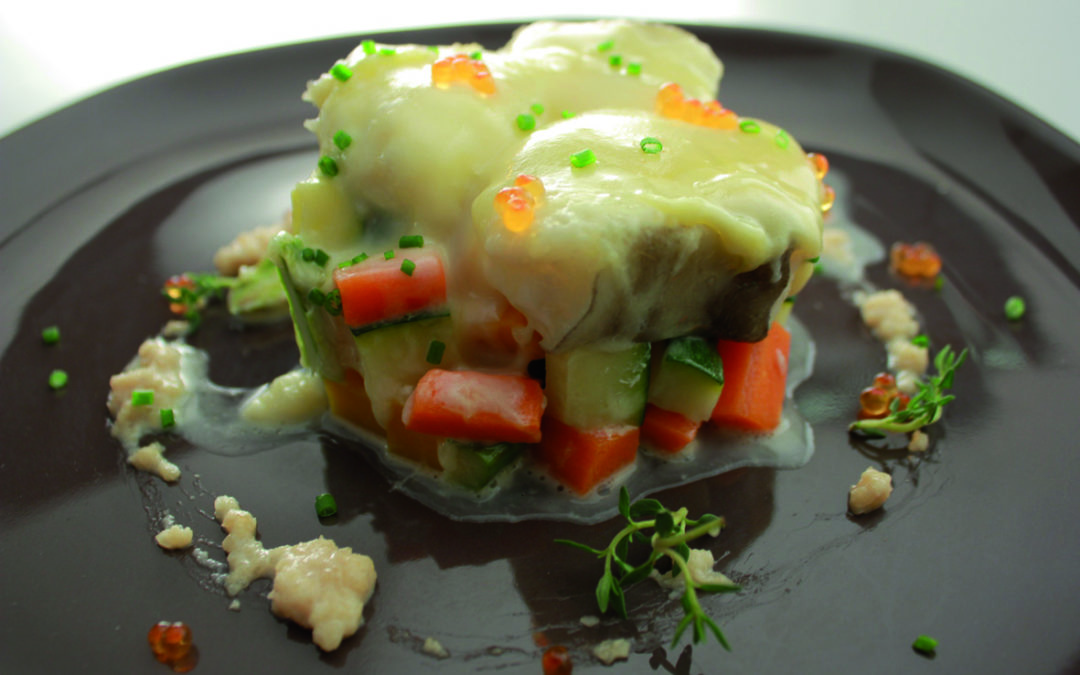 Dados de anguila con verduras al vapor y Queso Tetilla